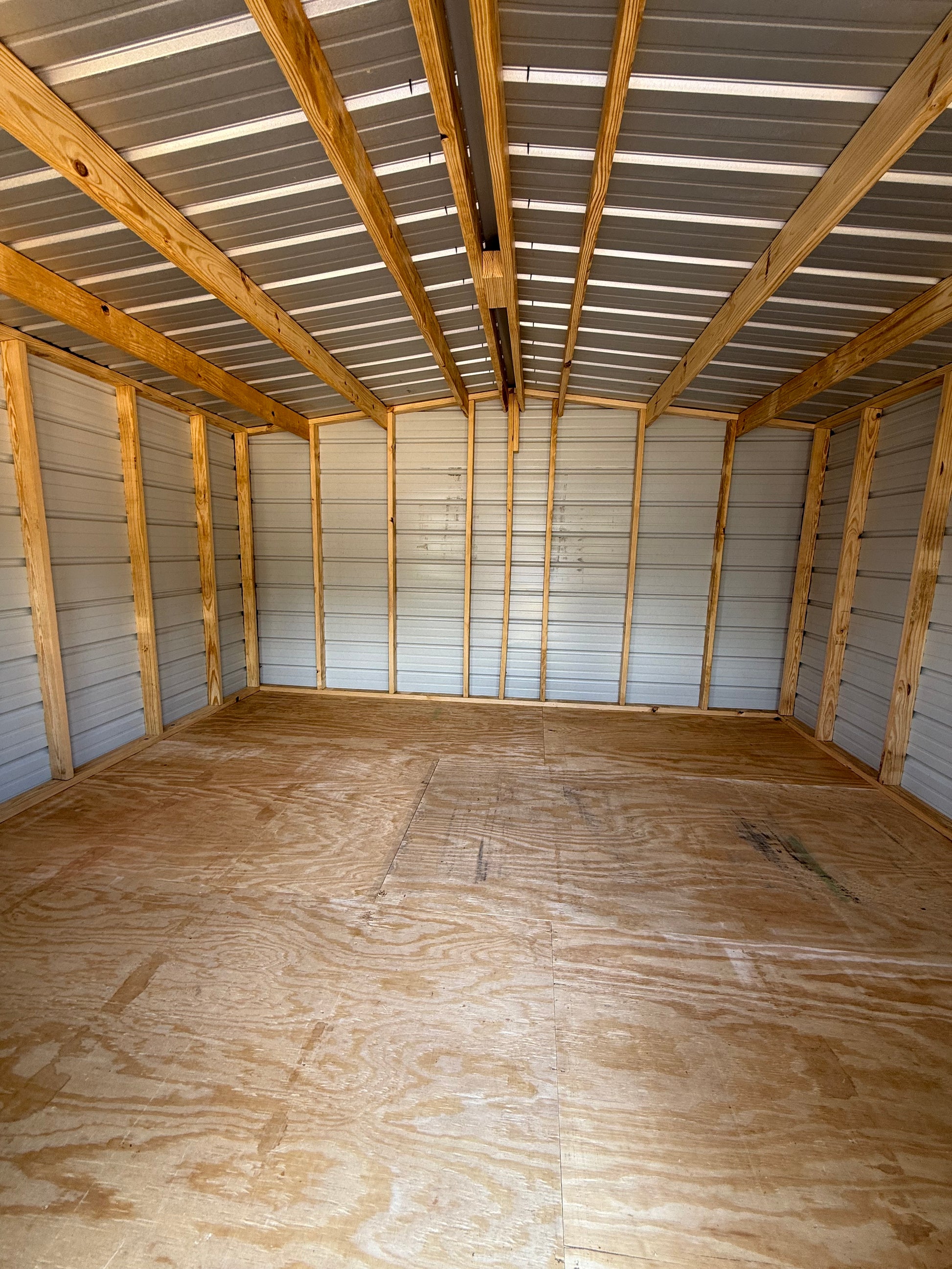 inside of 12x14 light stone/burnished slate regular roof portable building