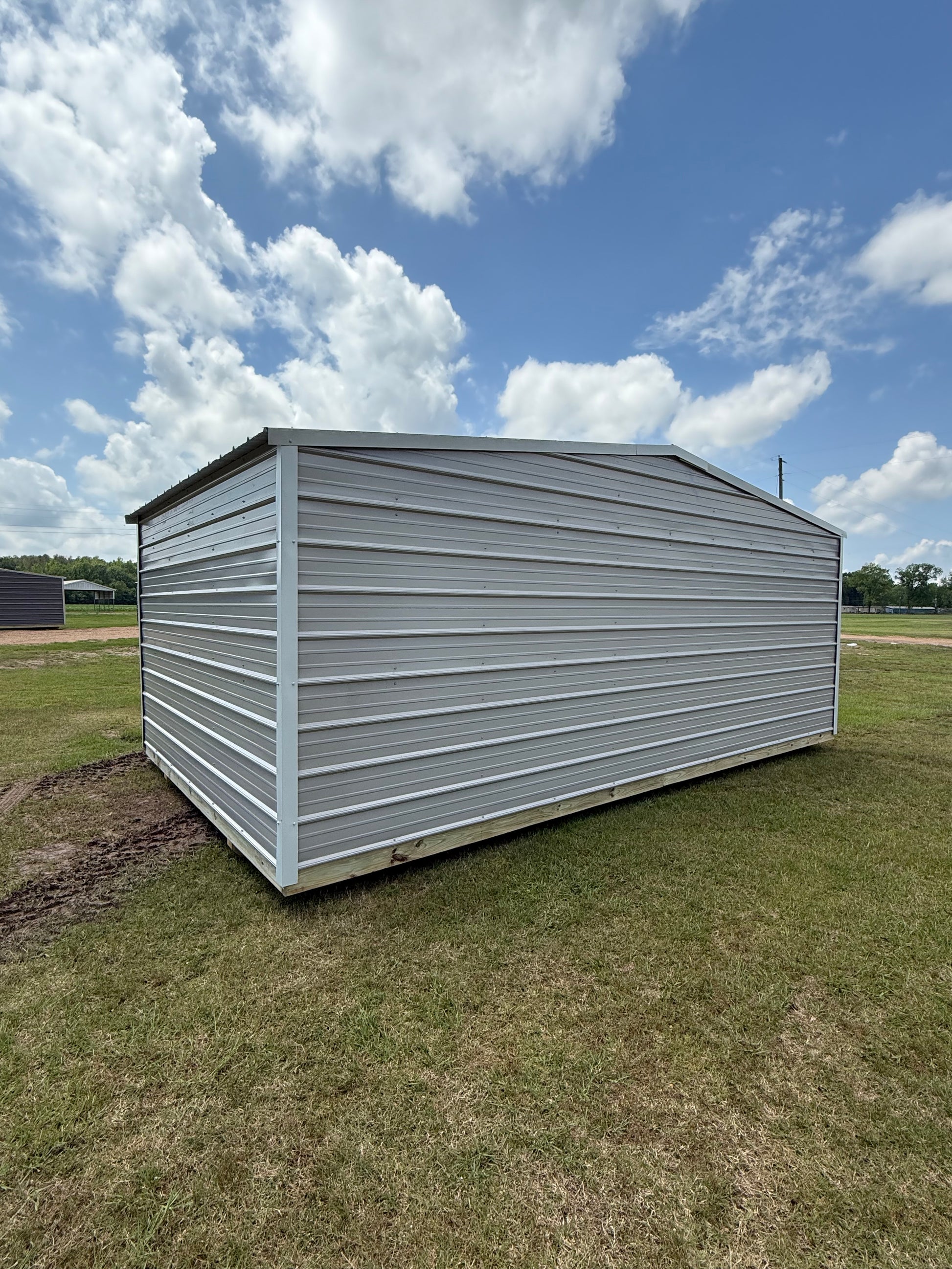 back/side of 12x20 regular roof portable building