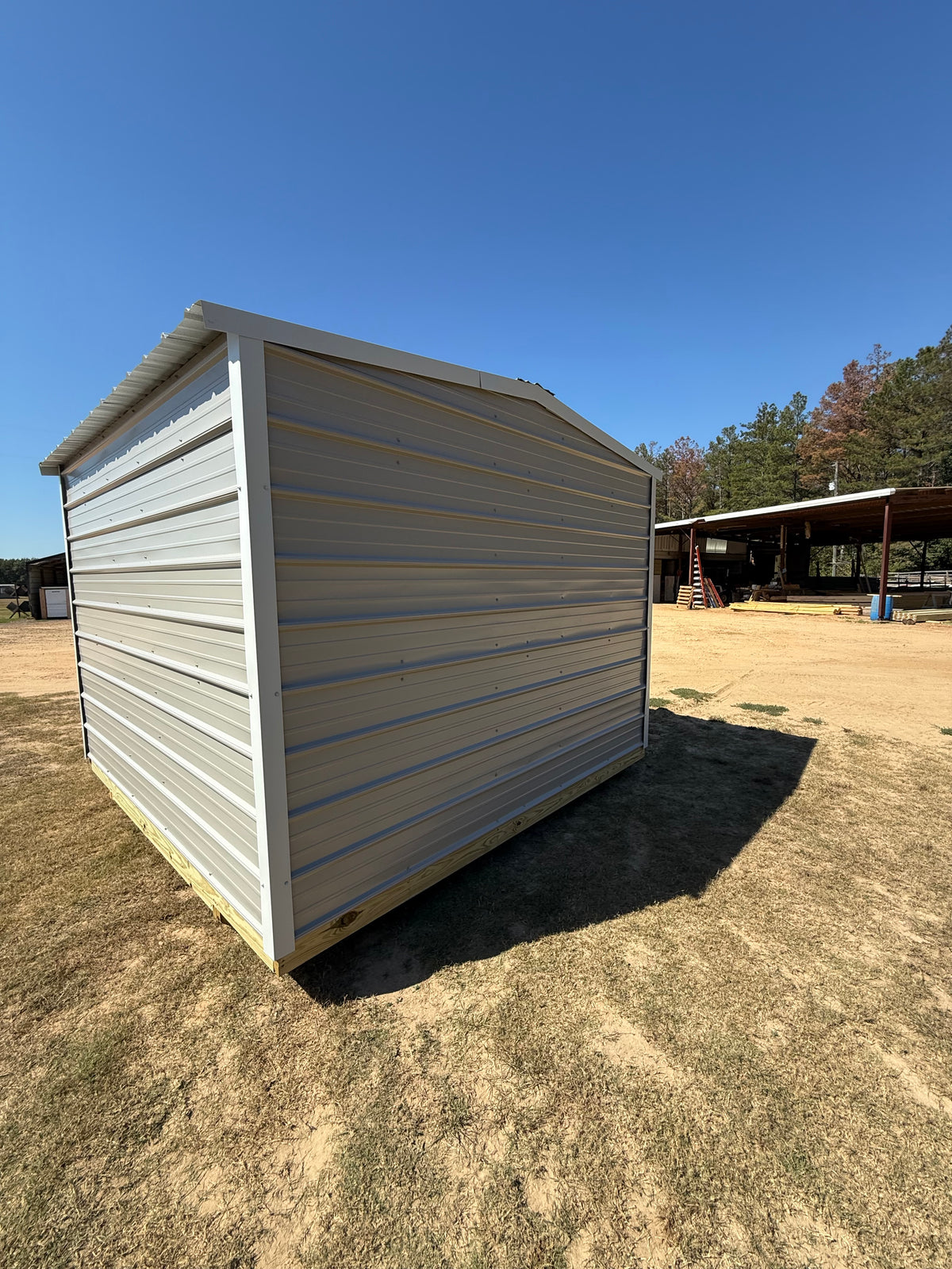 back/side view of regular roof portable building