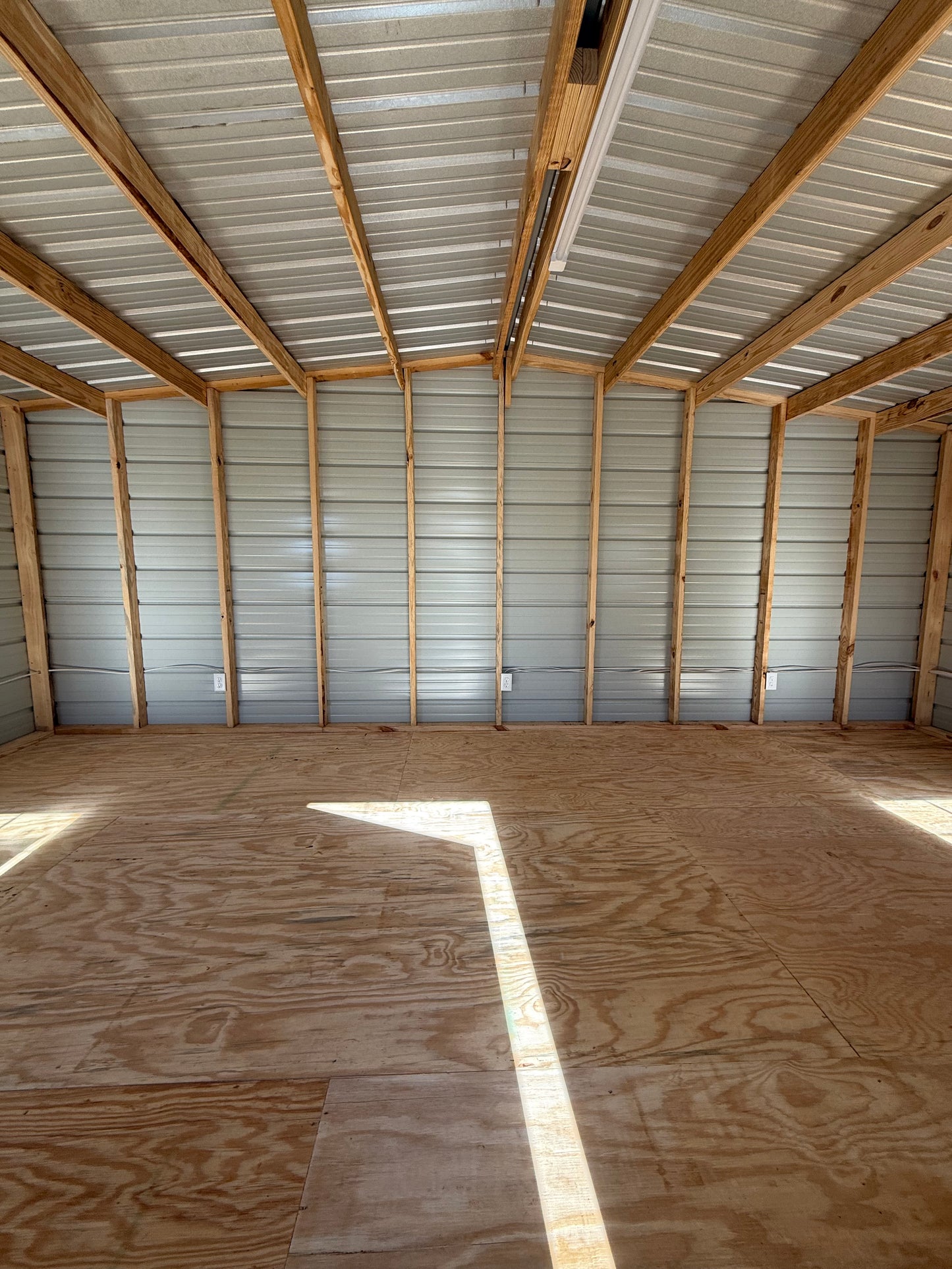 inside view of 12x20 regular roof building with electrical package