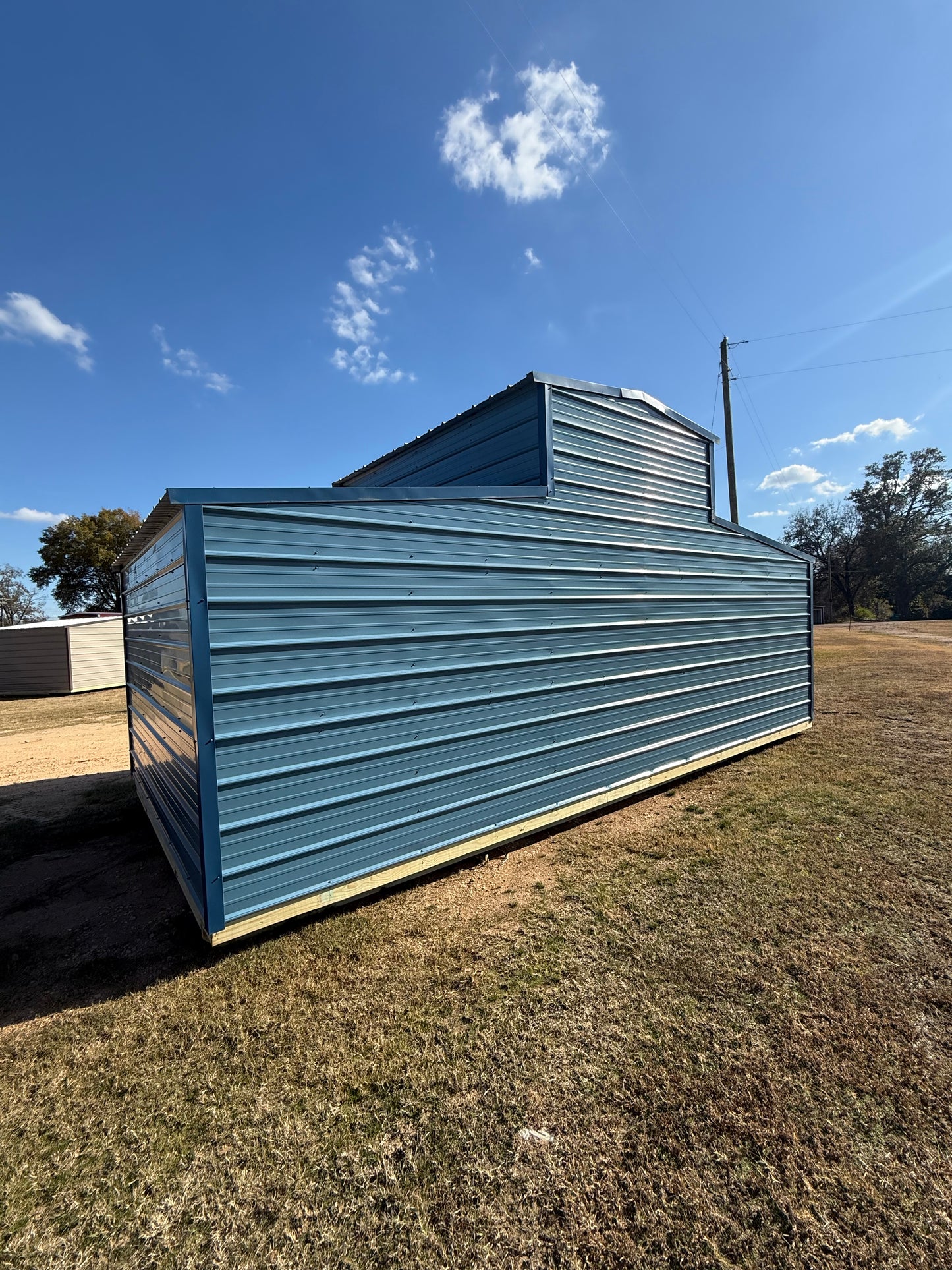 back view of 12x24 barn in ocean blue/gallery blue/charcoal