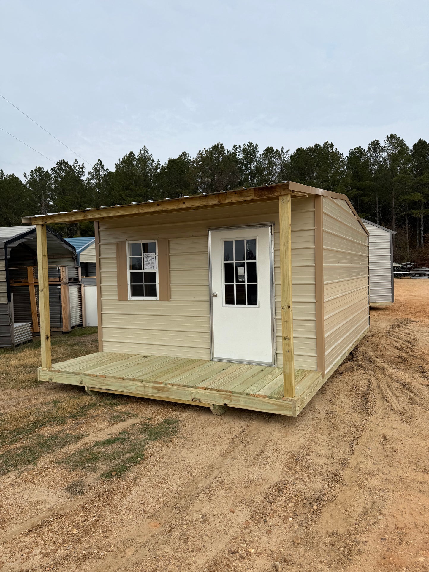 another view of front/porch of 12x20 shortgun cabin