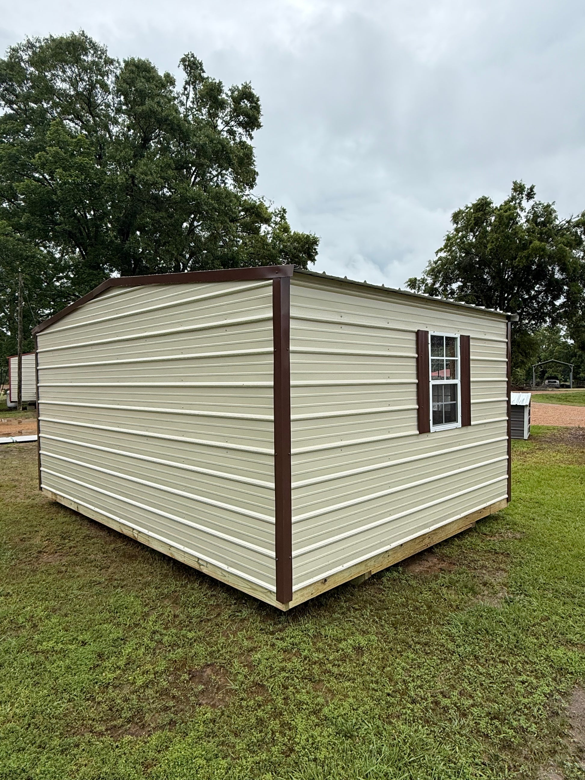 back/side view of 12x16 regular roof portable building 