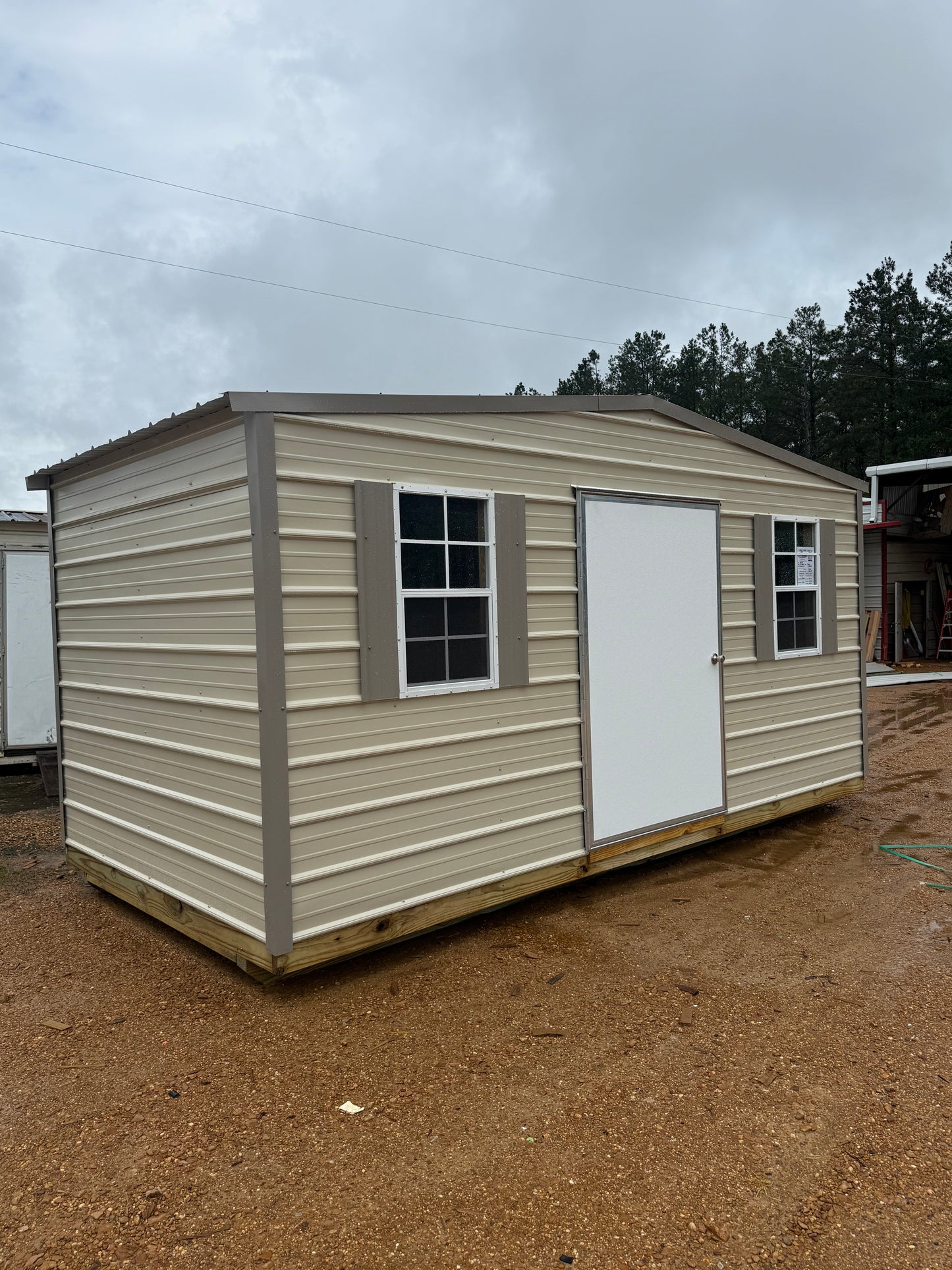 8x16 light stone/taupe regular roof portable building 