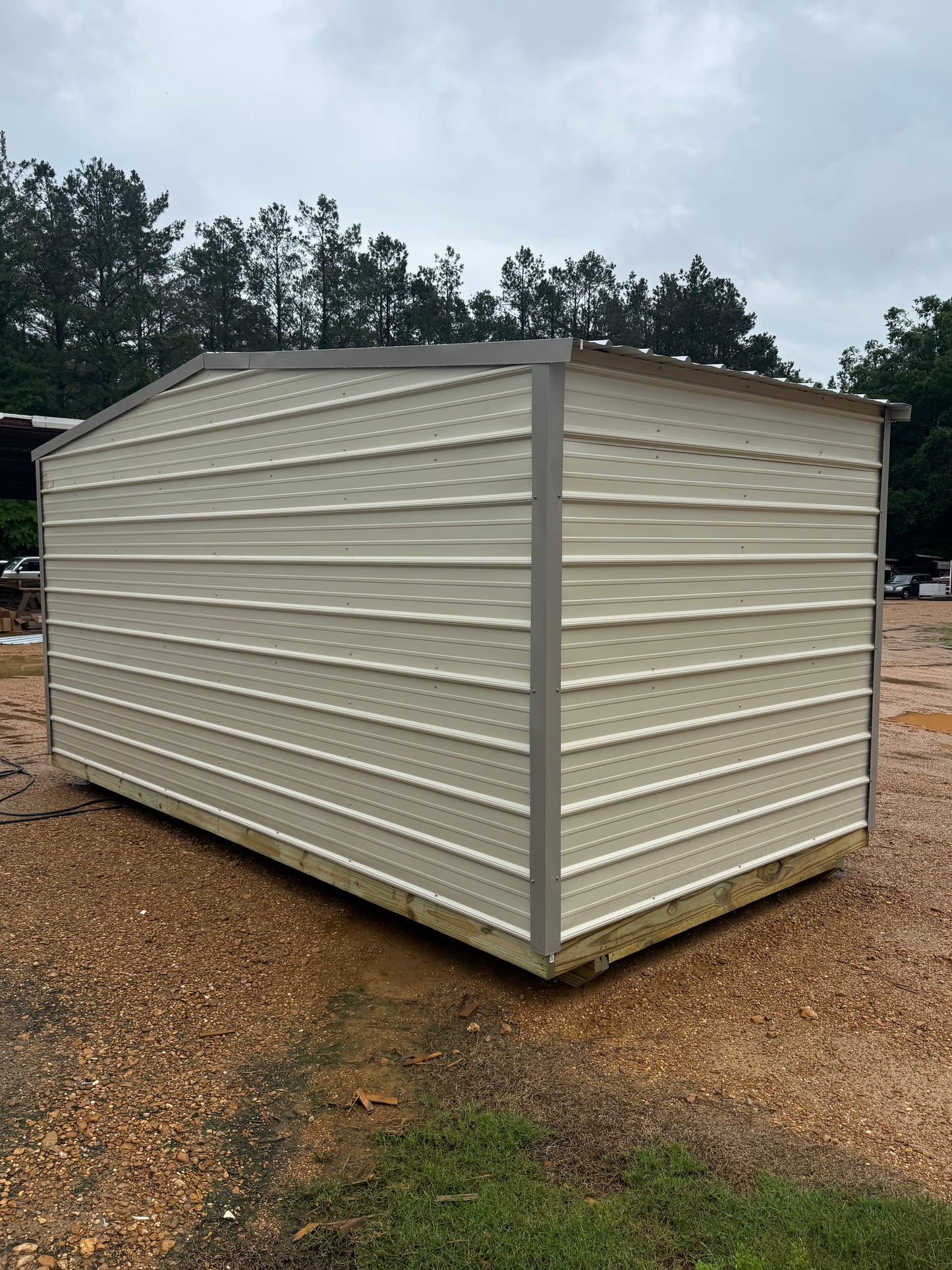 back/side view of 8x16 regular roof portable building 