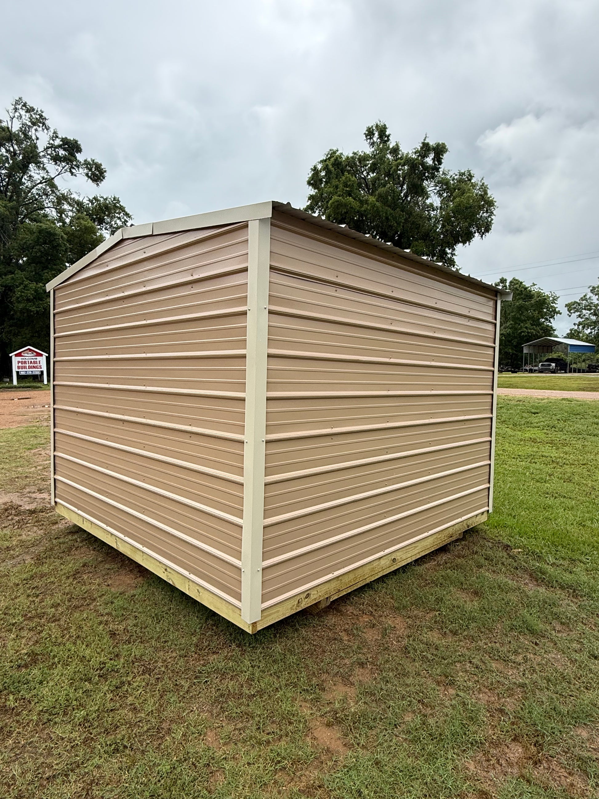 outside view of side/back of 10x10 regular roof portable building 