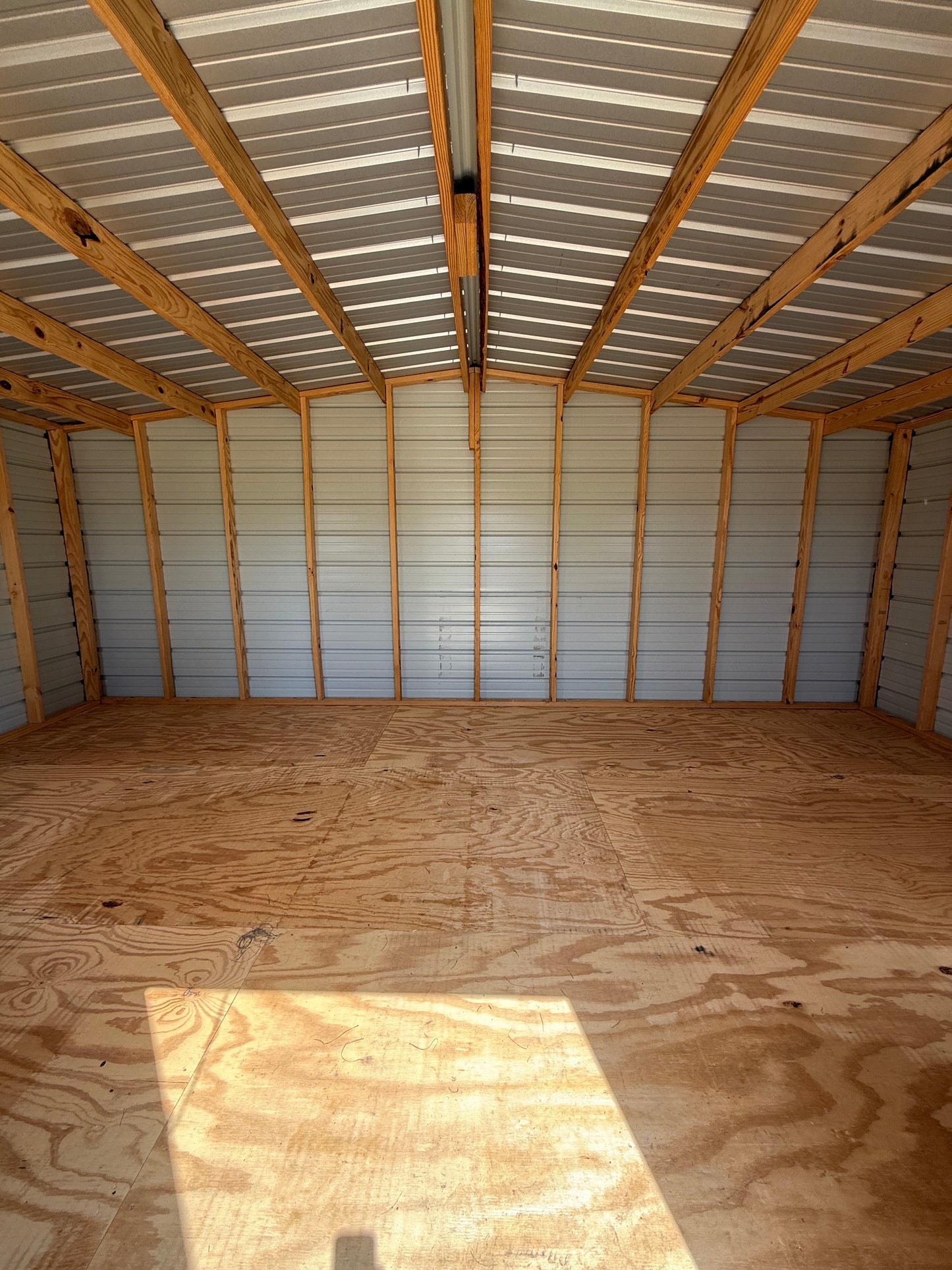 inside gray/white 12x20 portable storage building