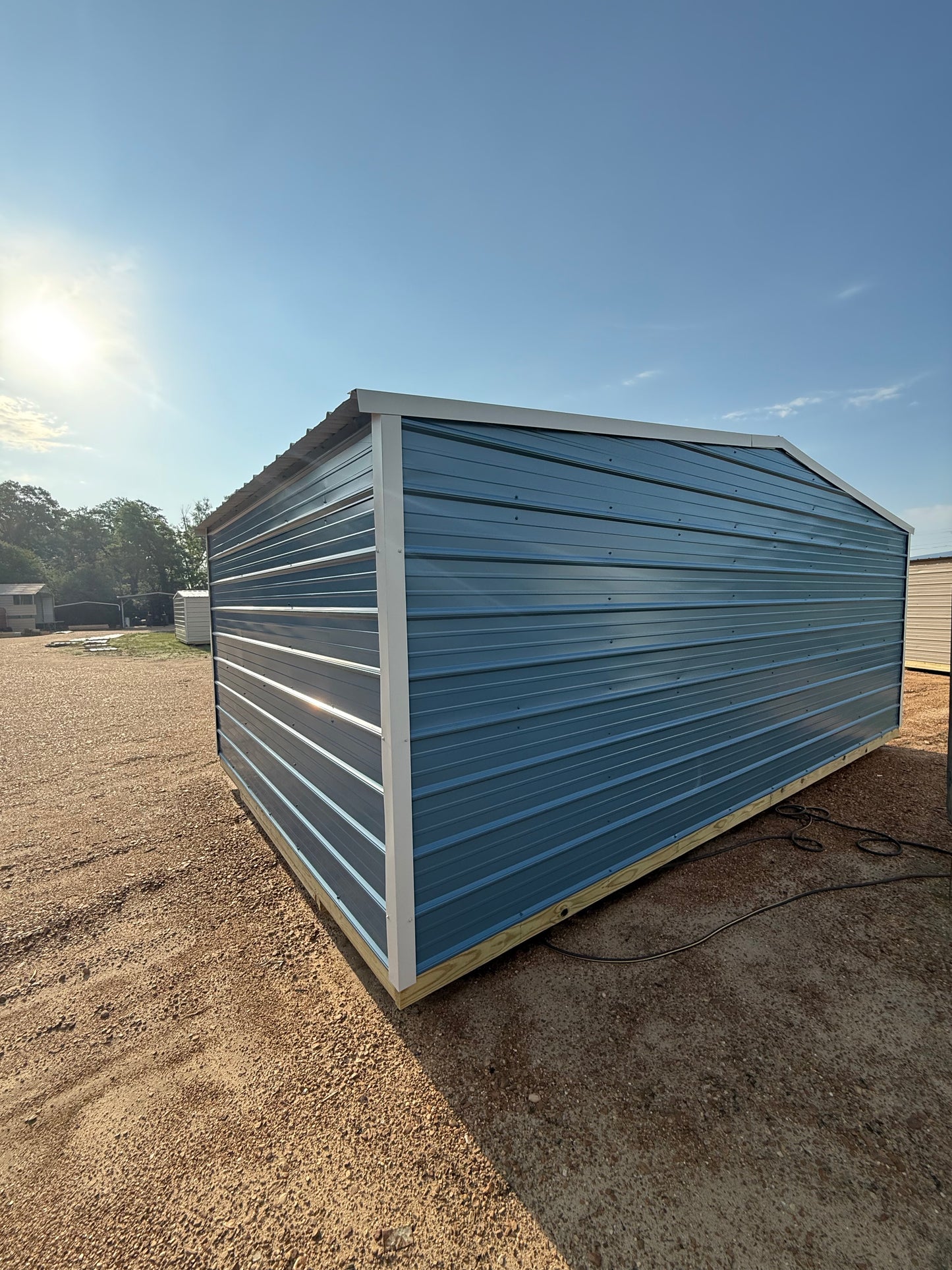 back/side of 12x20 regular roof portable building 