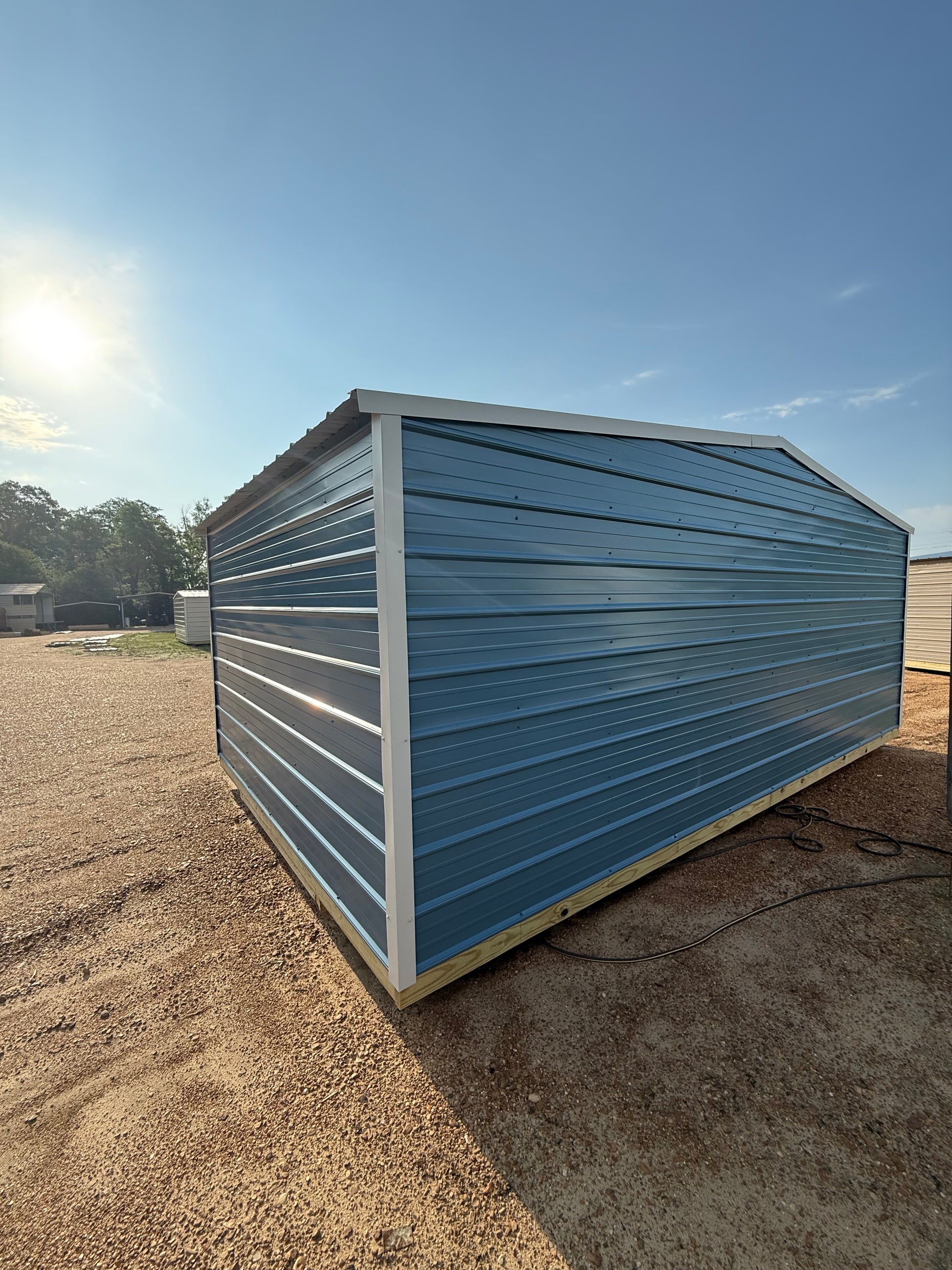 back/side of 12x20 regular roof portable building 