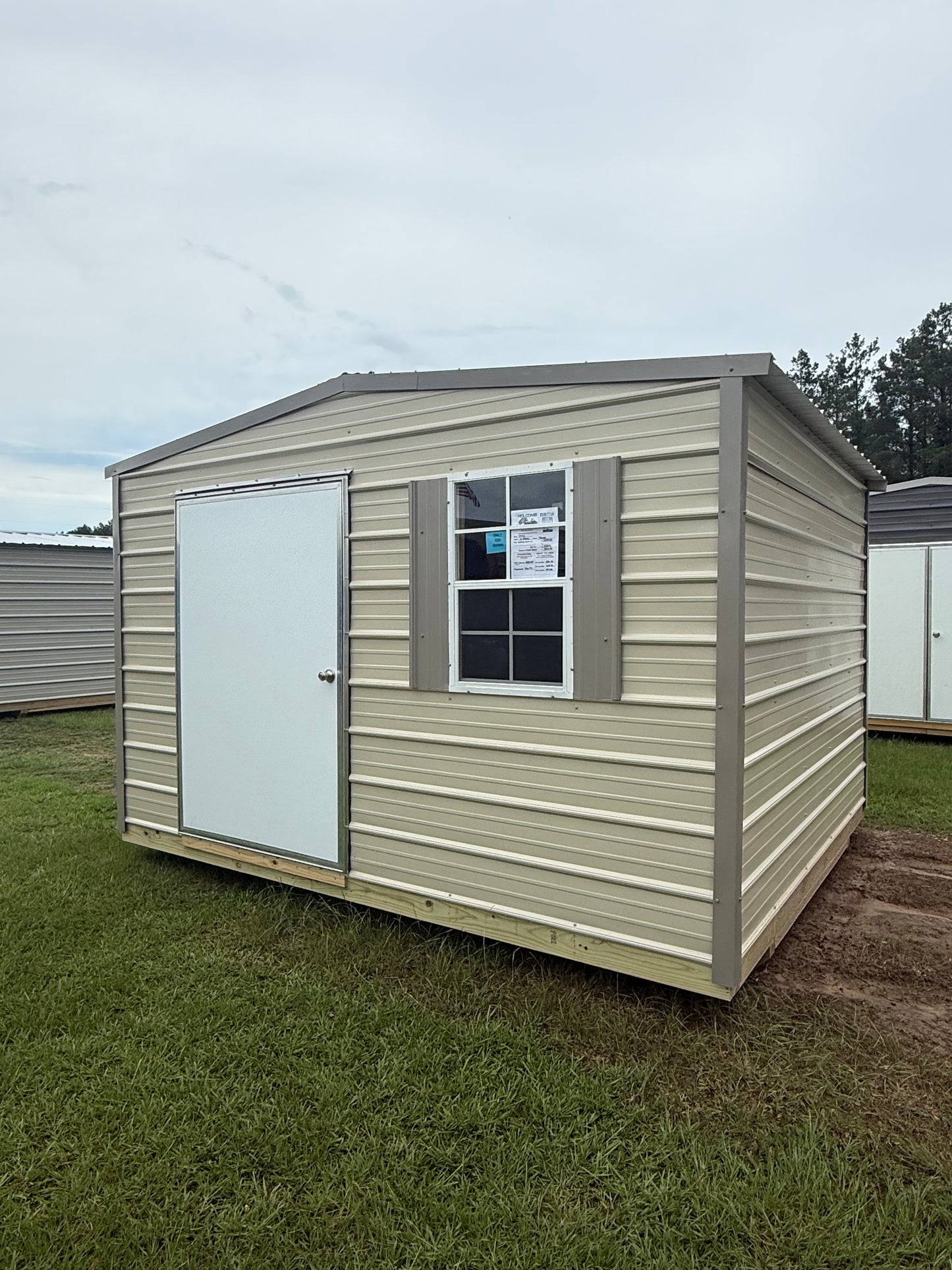 10x12 regular roof portable building in light stone/tauper