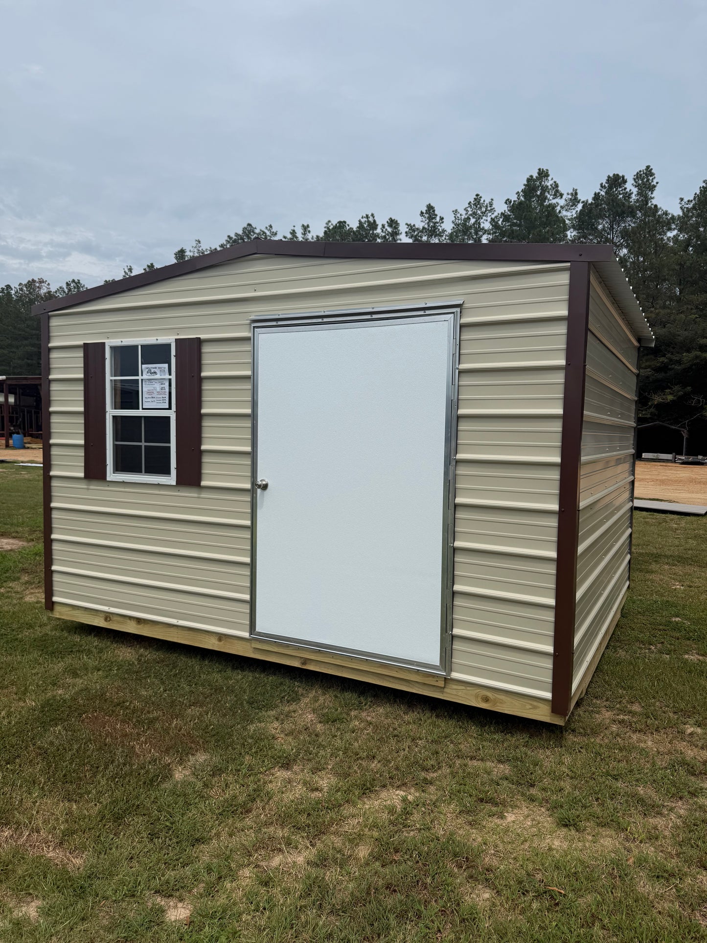 10x12 light stone/brown regular roof portable building 