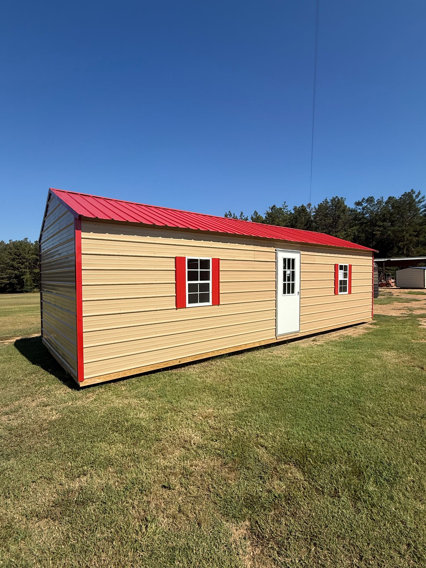 front view of 12x32 peak roof portable building 