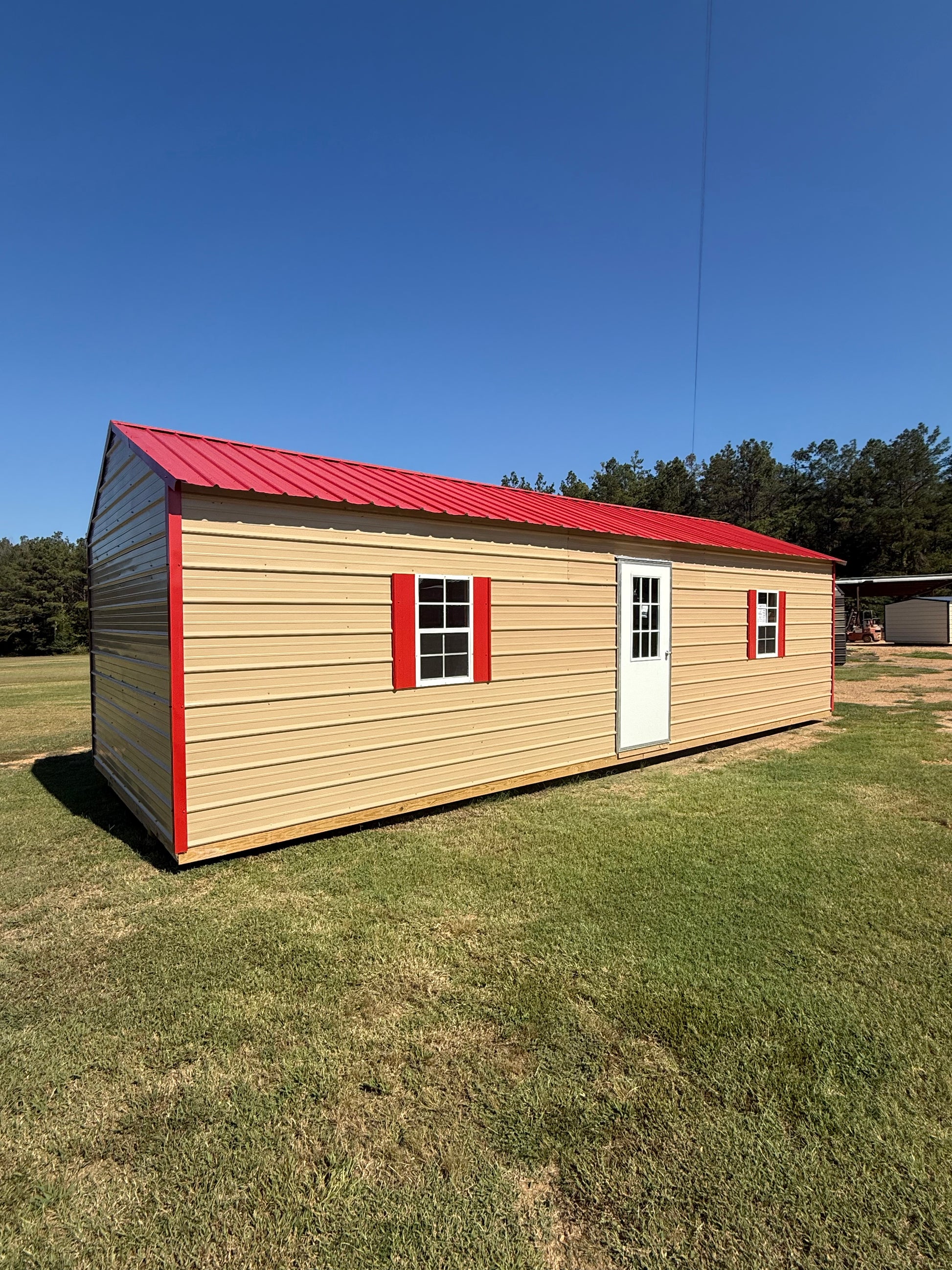 front view of 12x32 peak roof portable building 