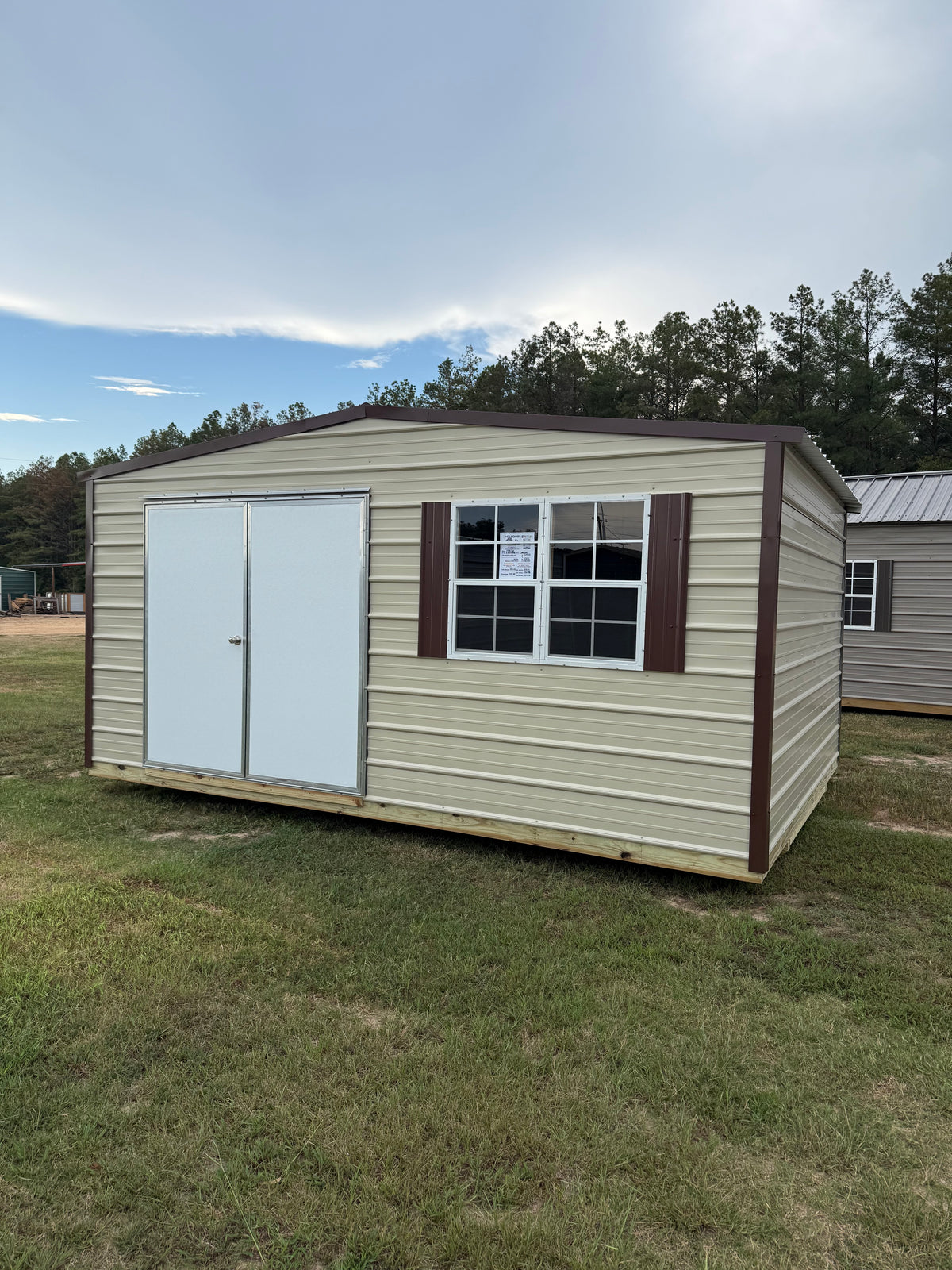 12x16 regular roof portable building with double door plus double windows in light stone/brown