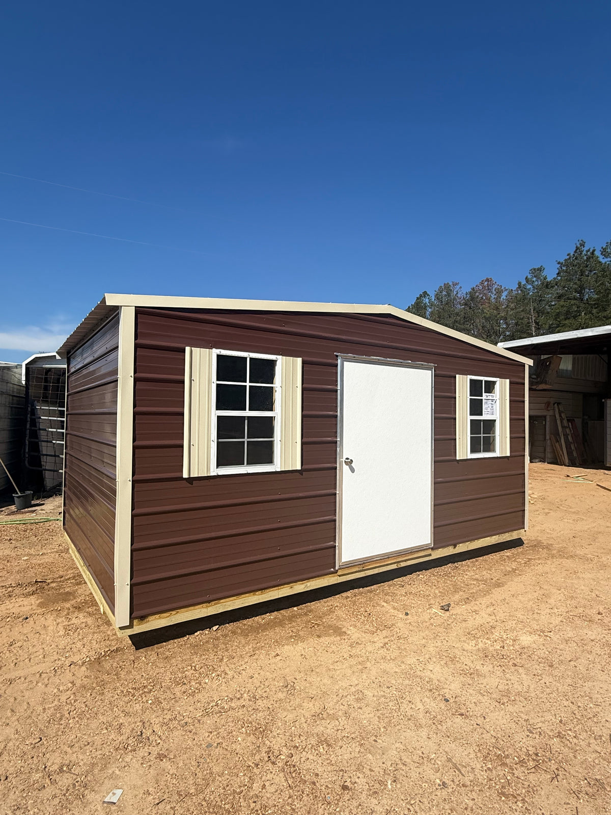 10x16 regular roof portable building brown/light stone