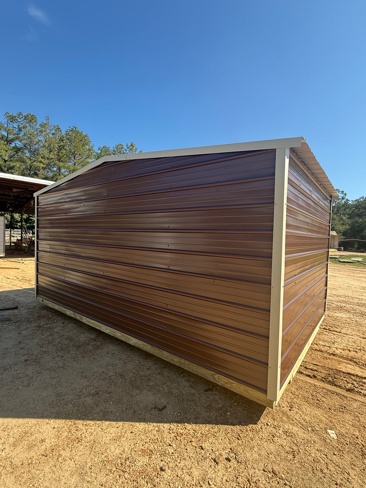back/side view of regular roof portable building 
