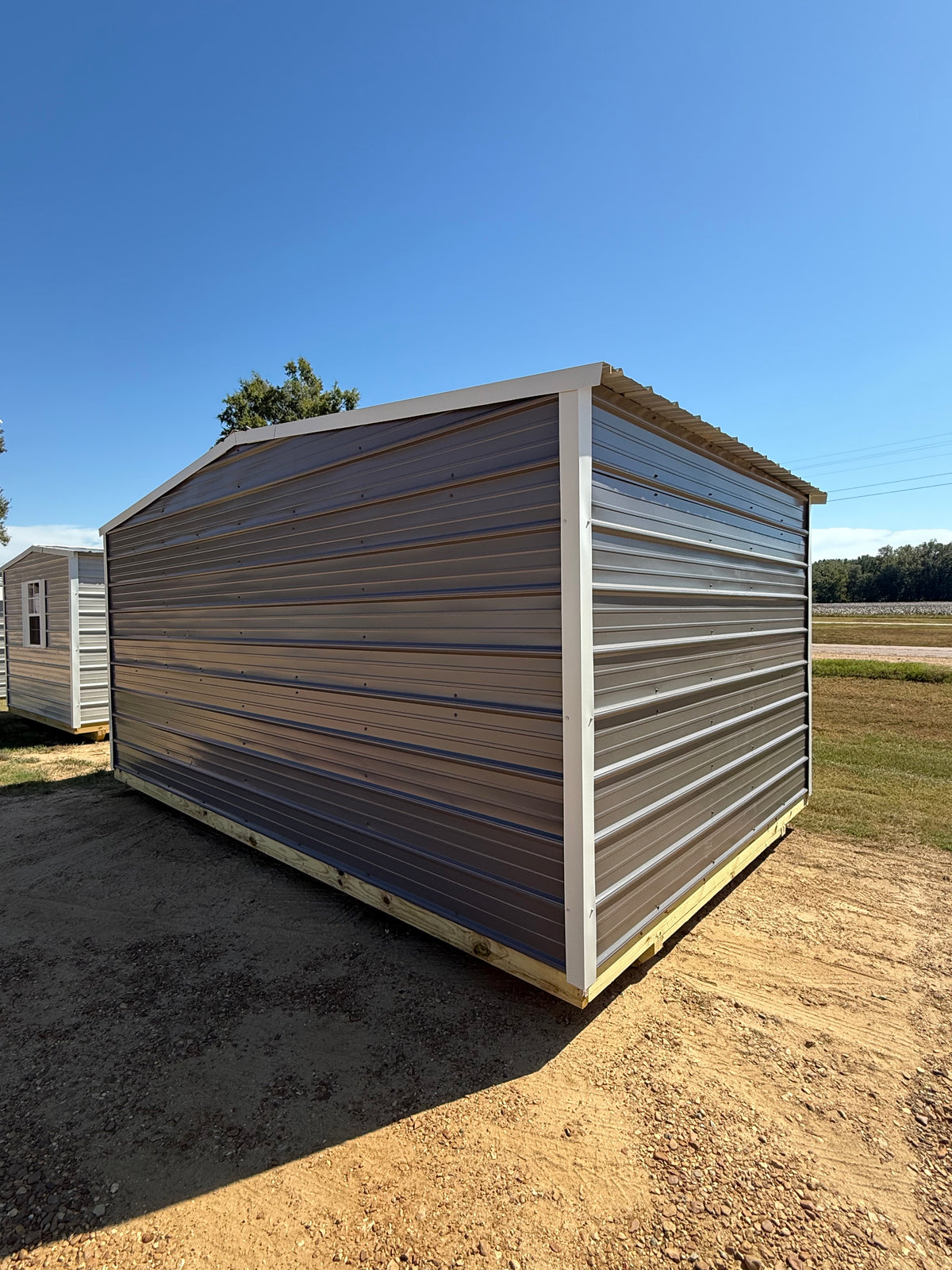 outside view of 10x16 charcoal/alamo white portable building