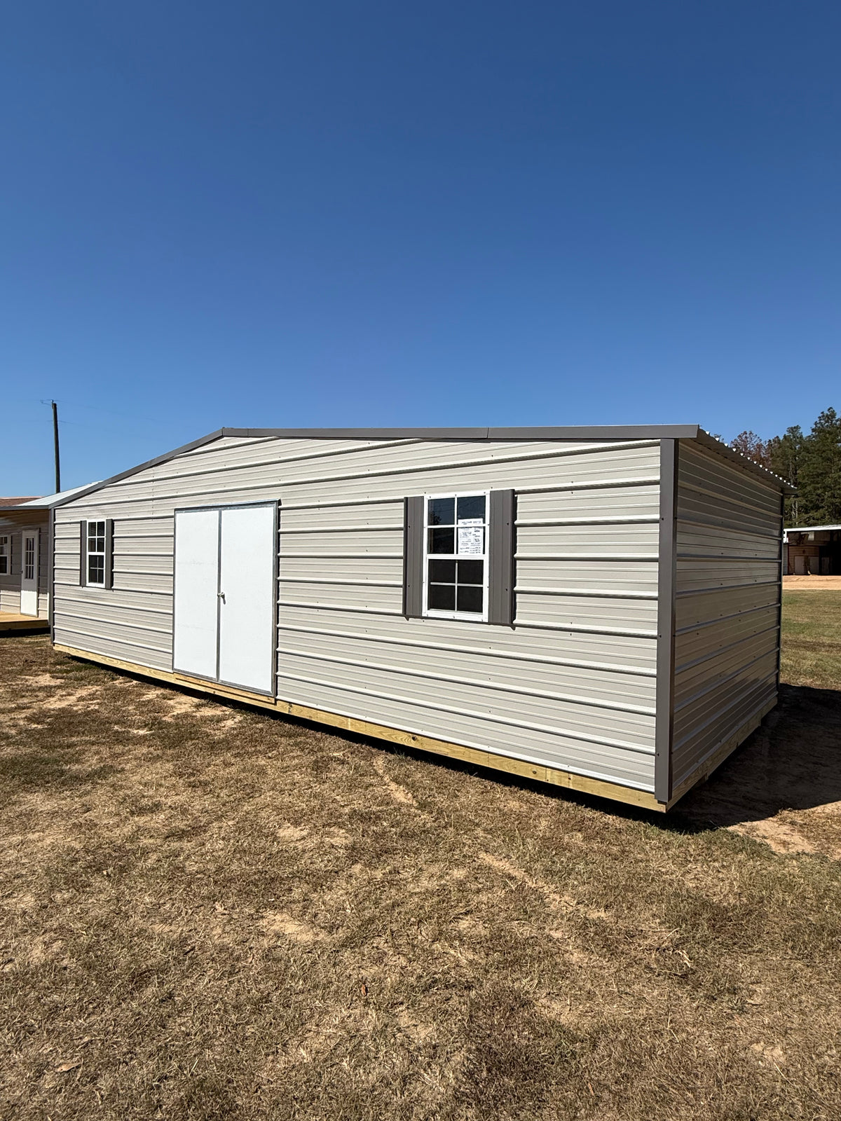 12x30 Regular roof portable building in gray/charcoal with 6' double doors