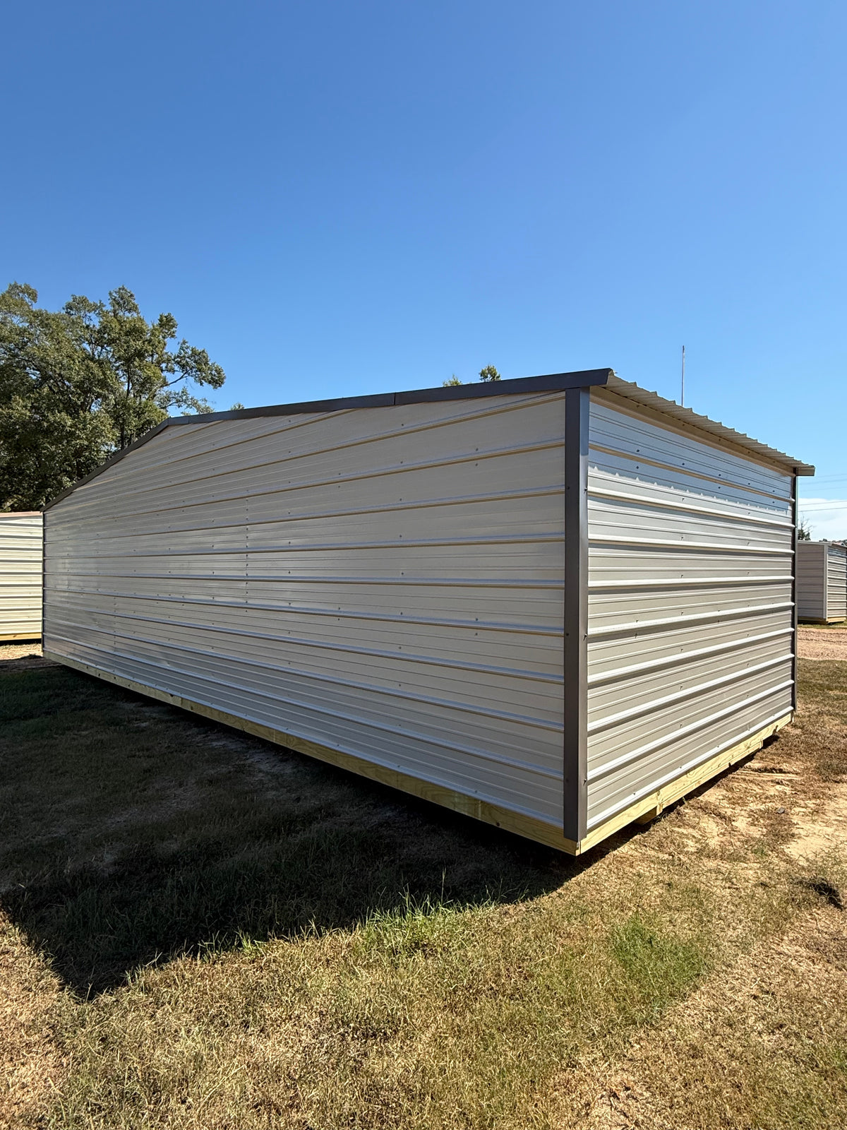 back/side view of 12x30 regular roof portable building 