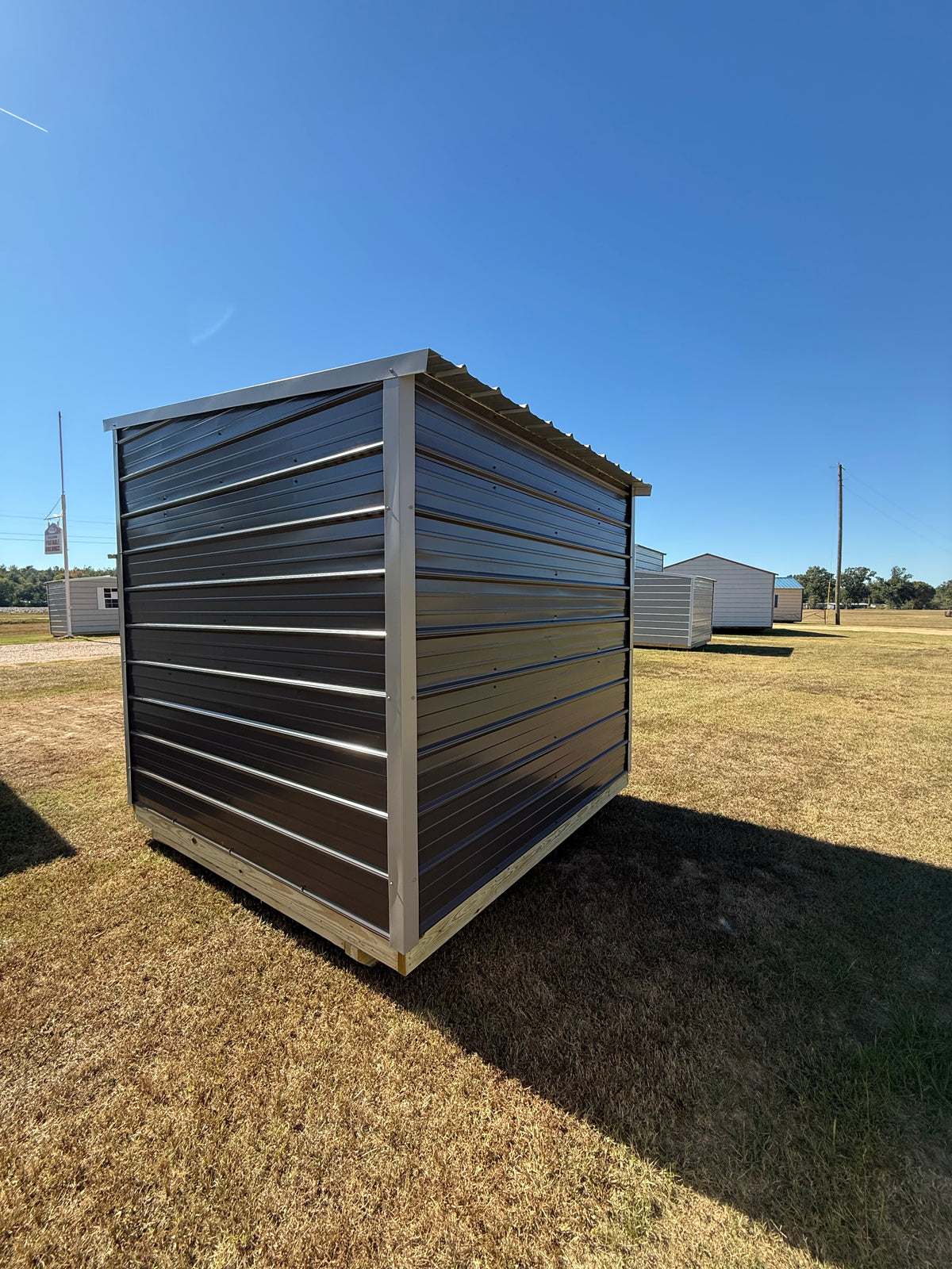back/side view of 8x8 slant roof portable building 