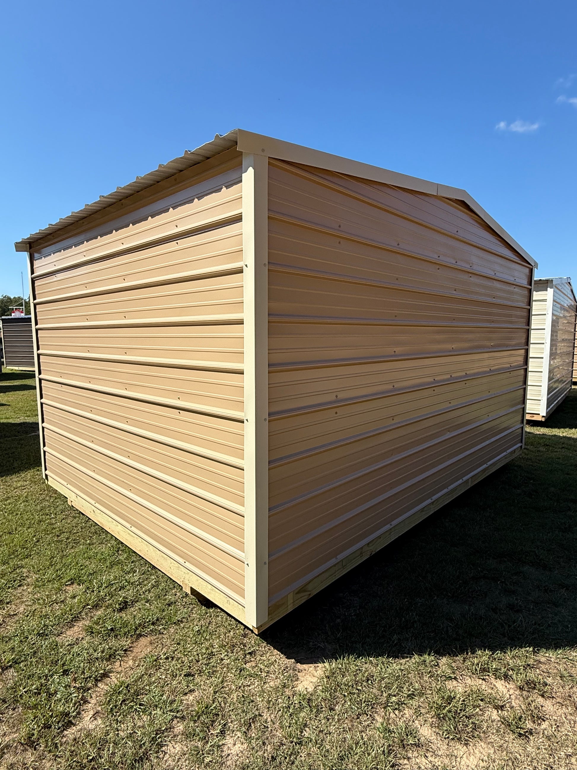 Back/Side view of 10x14 Tan/Light Stone Regular Roof Portable Building