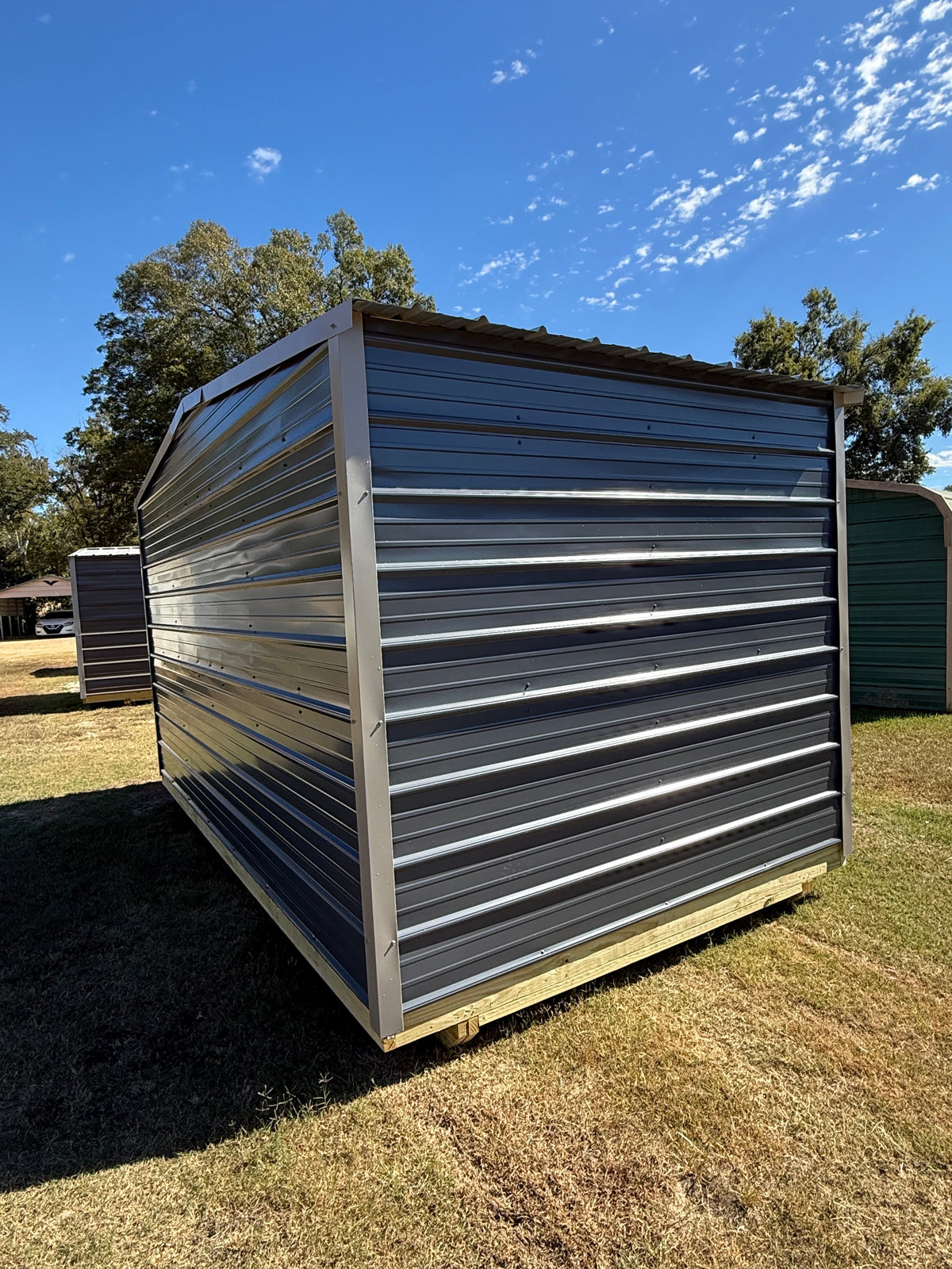 back/side view of 8x14 regular roof portable building 