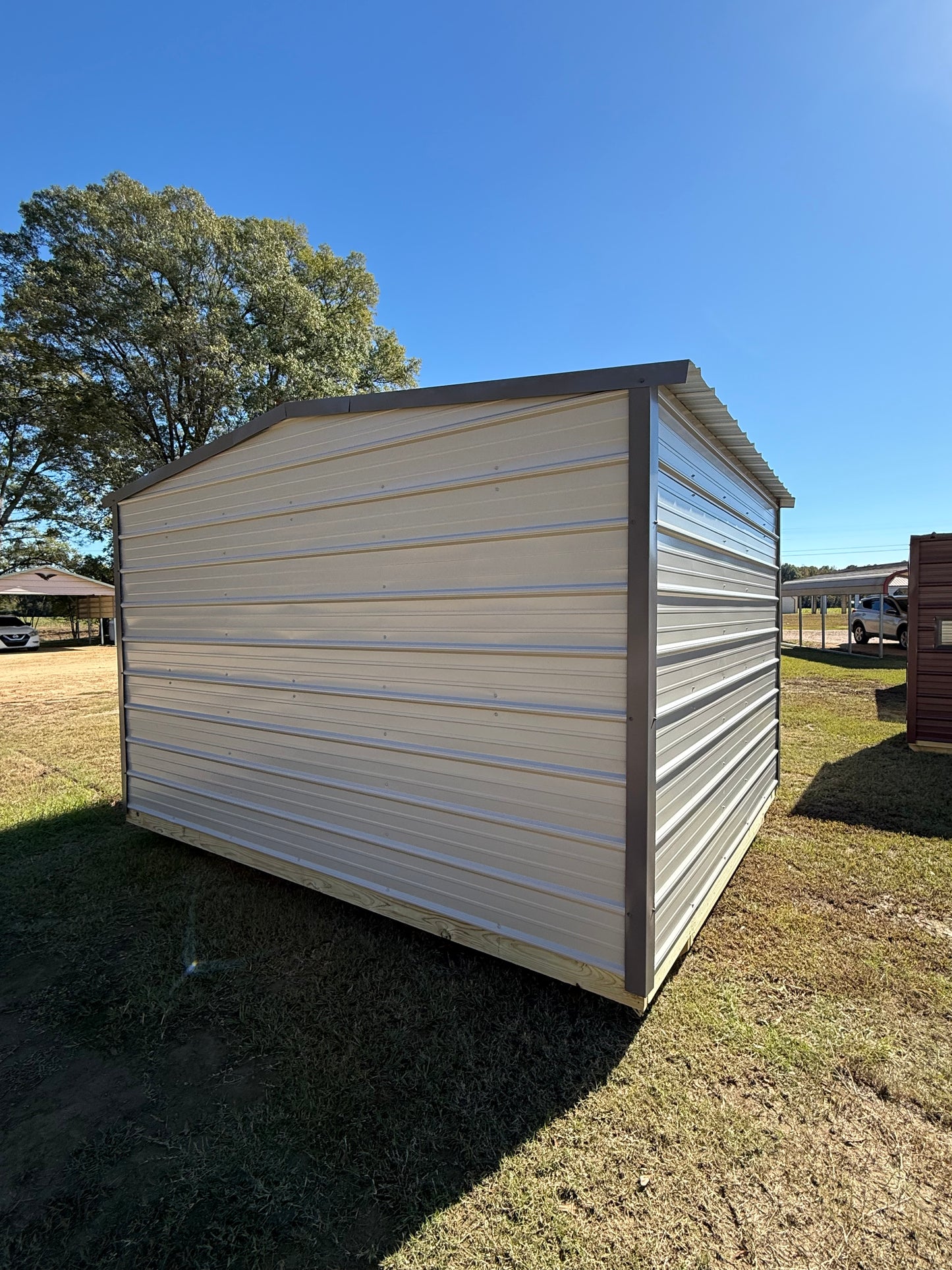 back/side view of 10x12 regular roof portable building 
