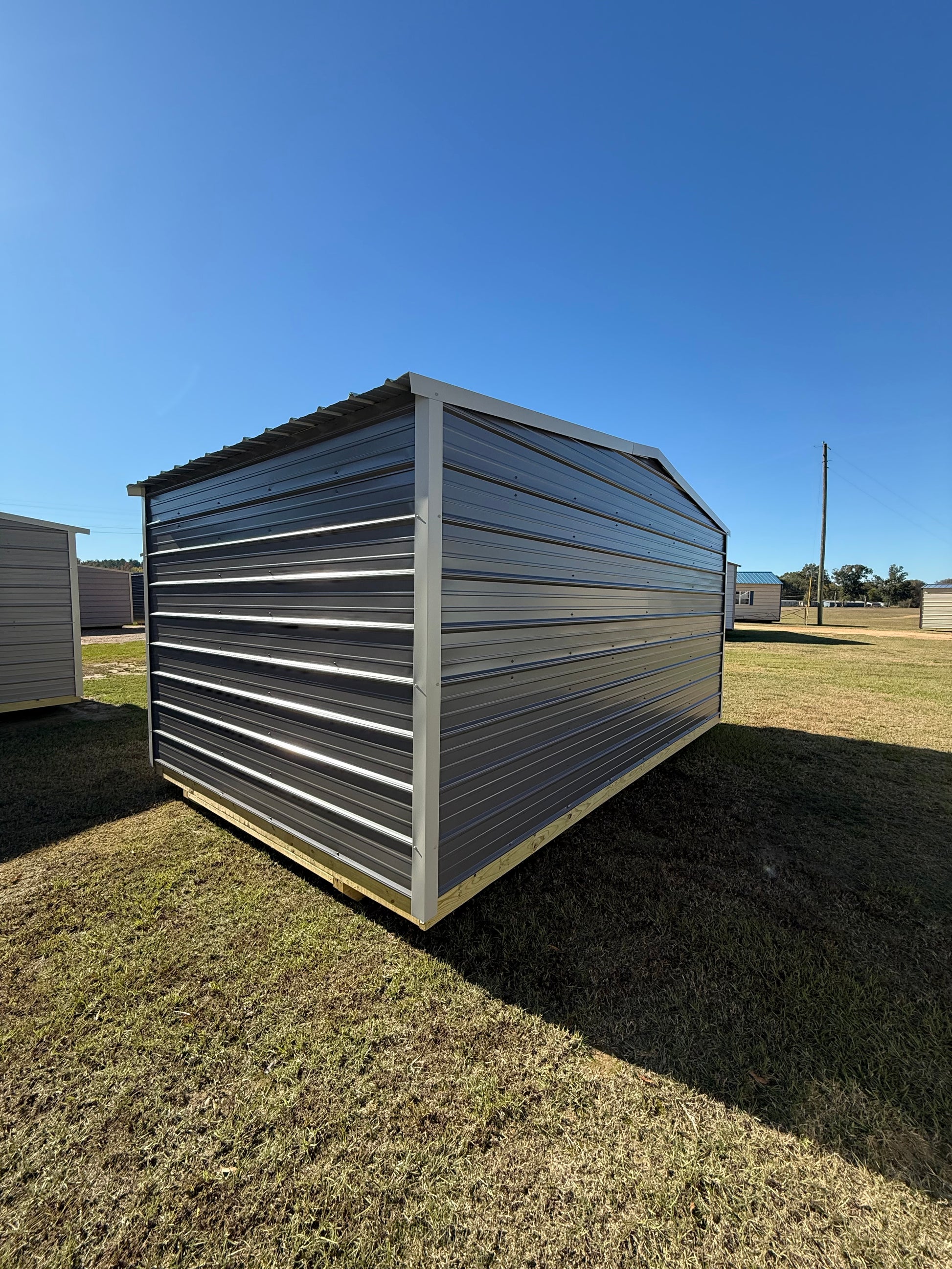 side/back view of 10x16 regular roof portable building 