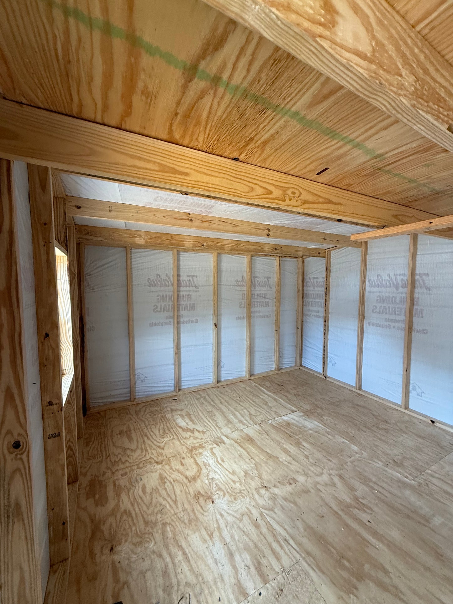 inside 12x24 barn with house wrap