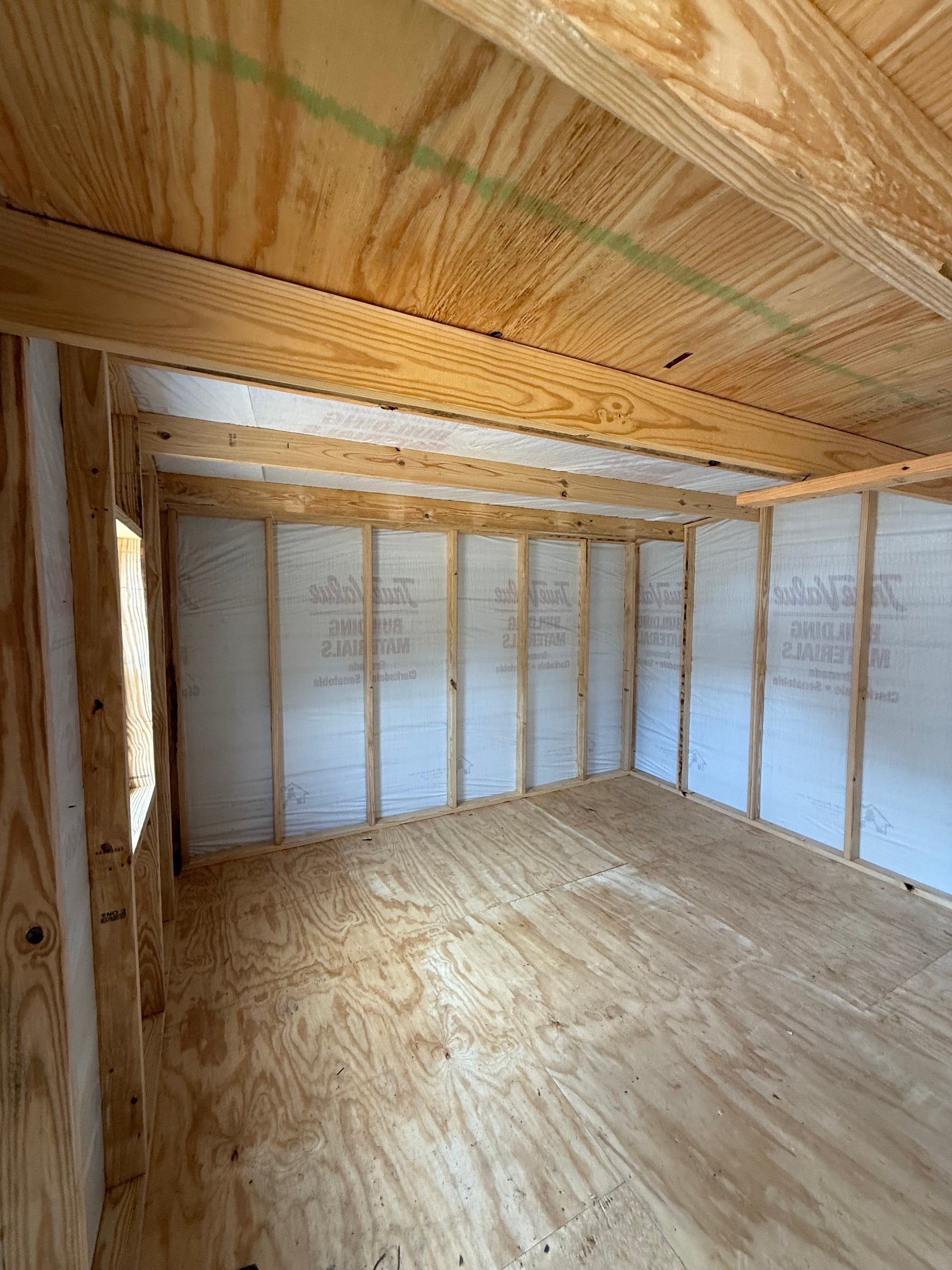 inside 12x24 barn with house wrap