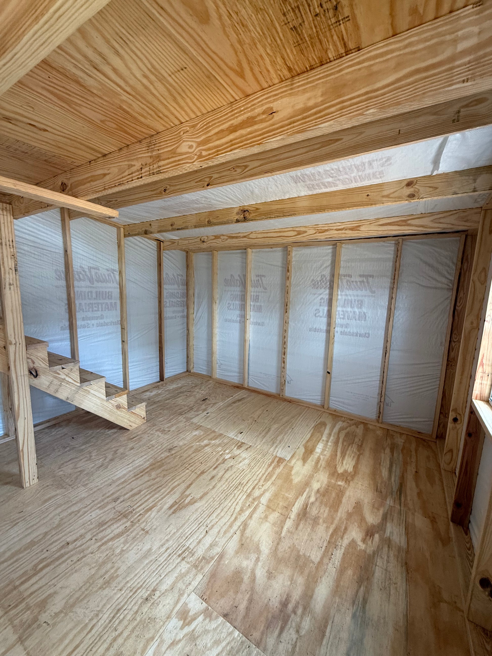 inside 12x24 barn with house wrap
