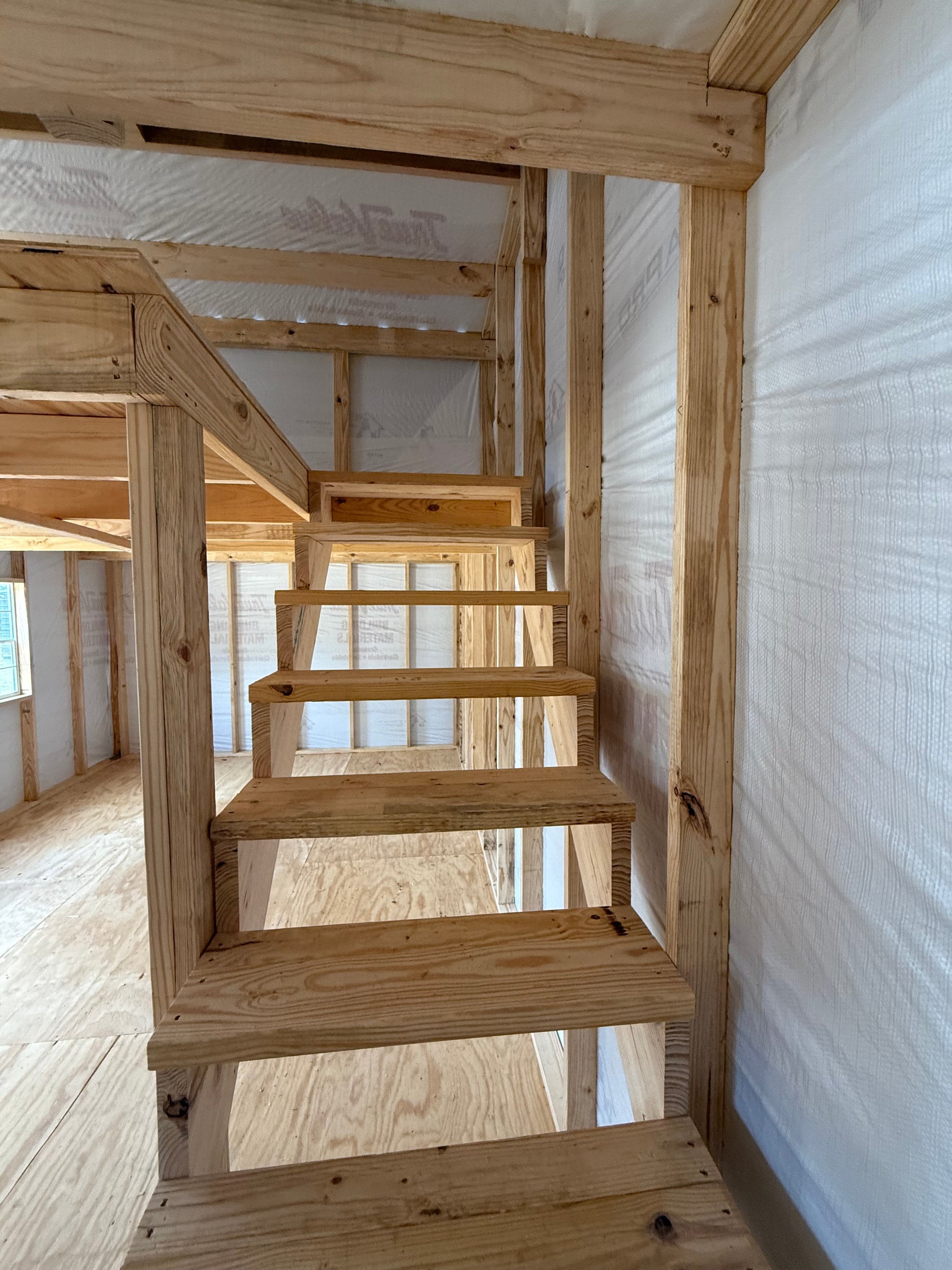 stairs in the barn leading up to 8x12 loft area