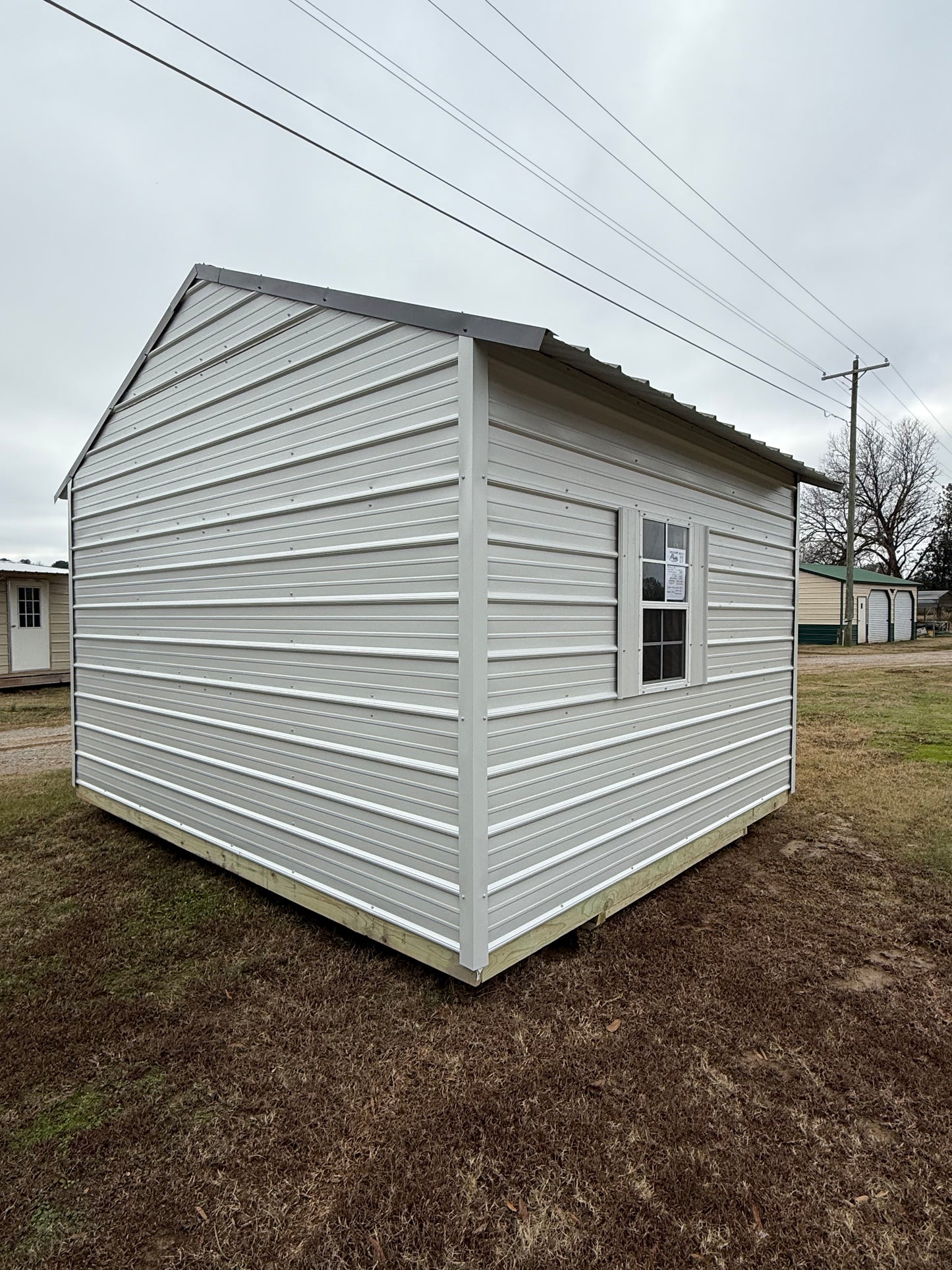 back/side view of A-frame portable building 