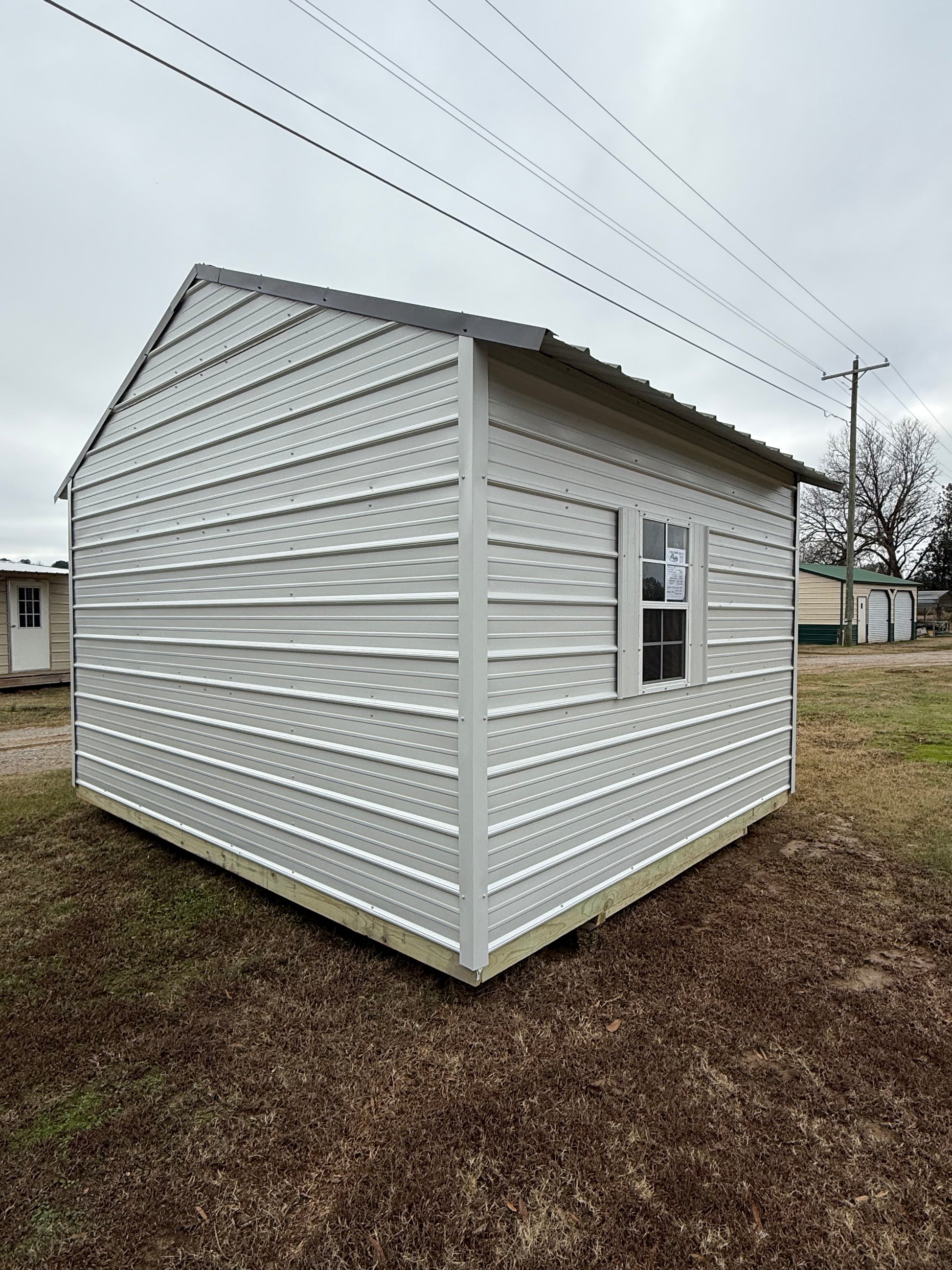 back/side view of A-frame portable building 