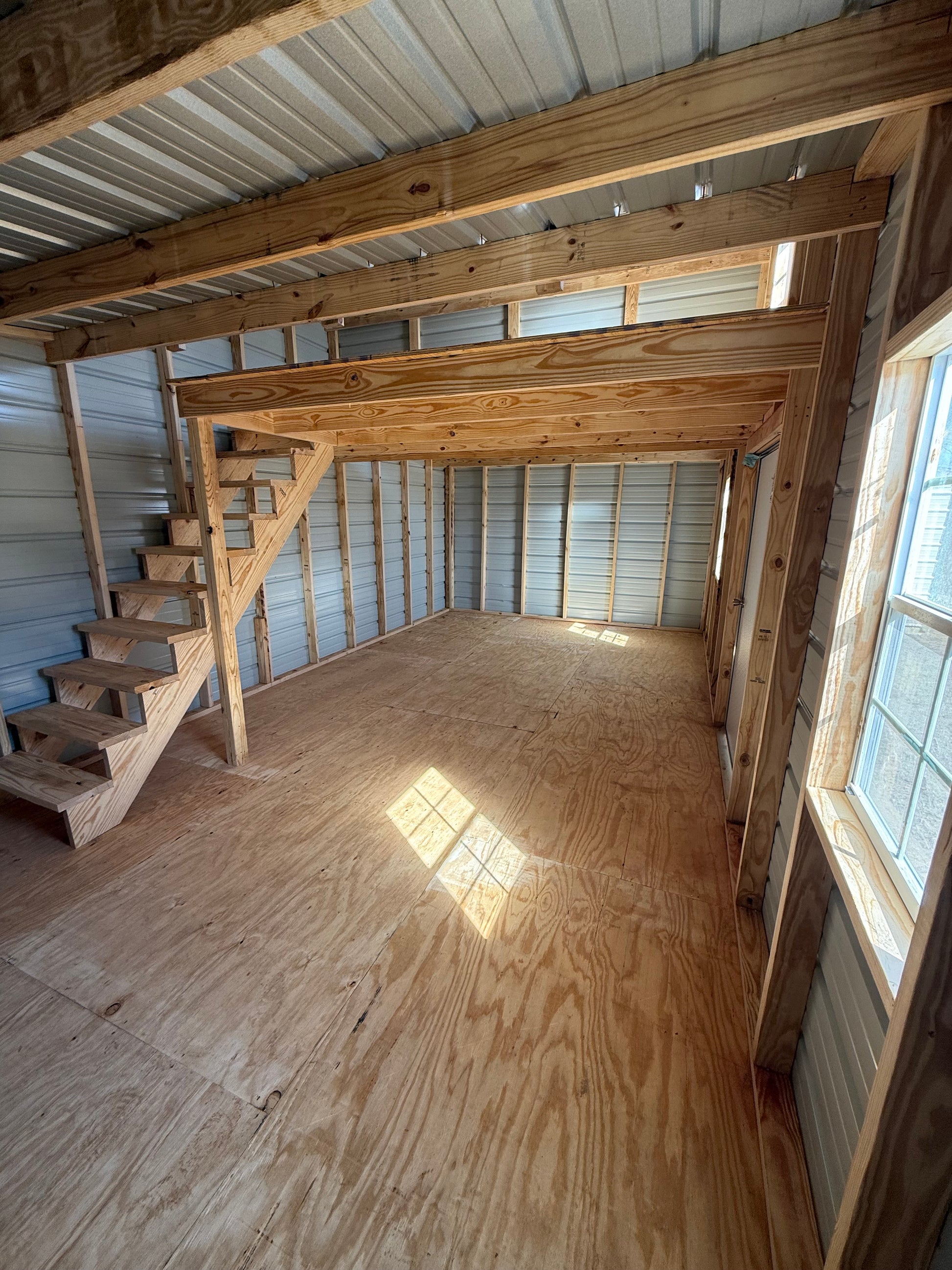 inside view of 12x24 portable building with loft 
