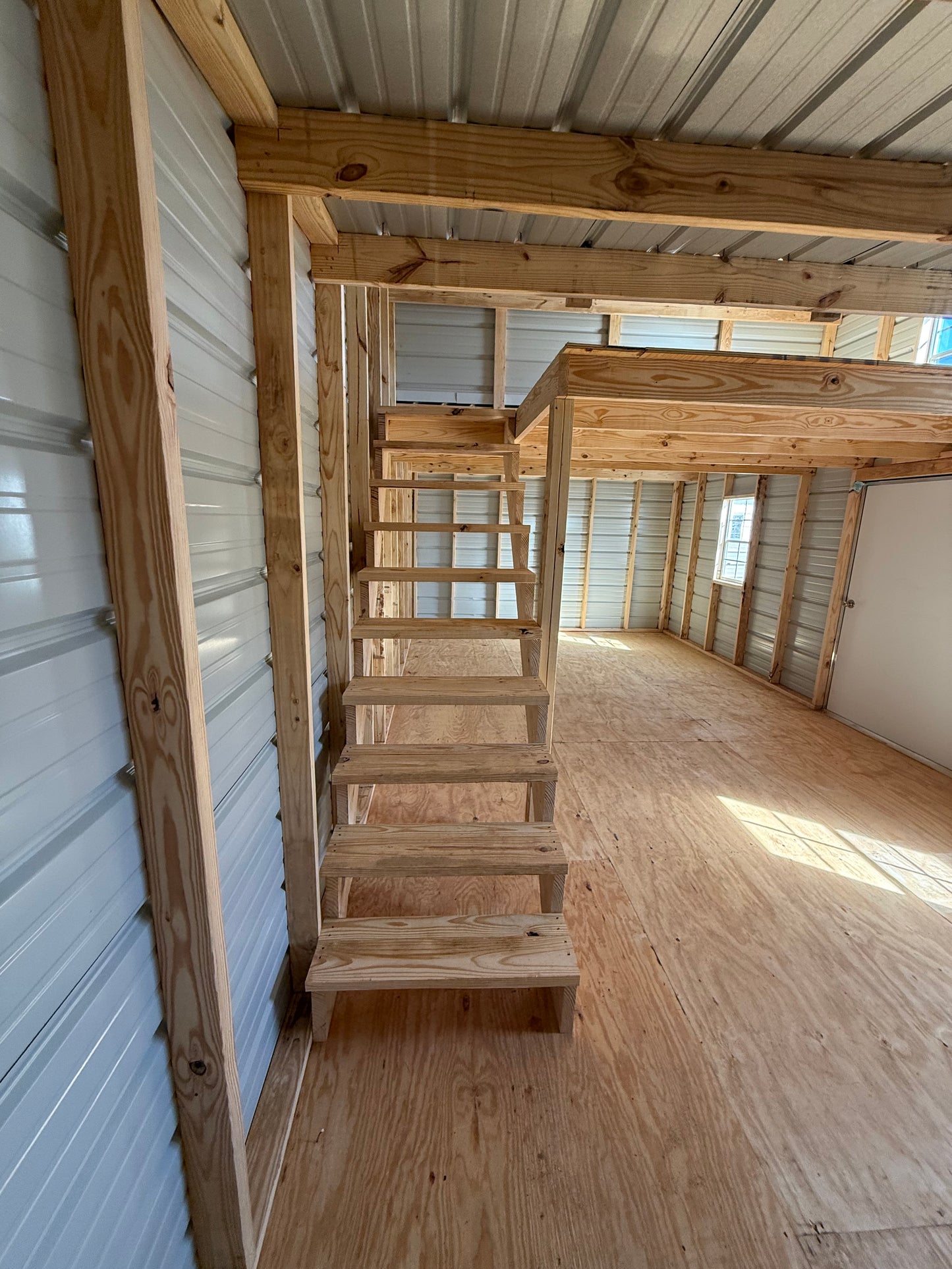 stairs leading up to loft area of barn 