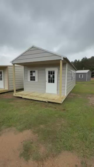 video showing the 12x32 peak roof cabin in gray/alamo white
